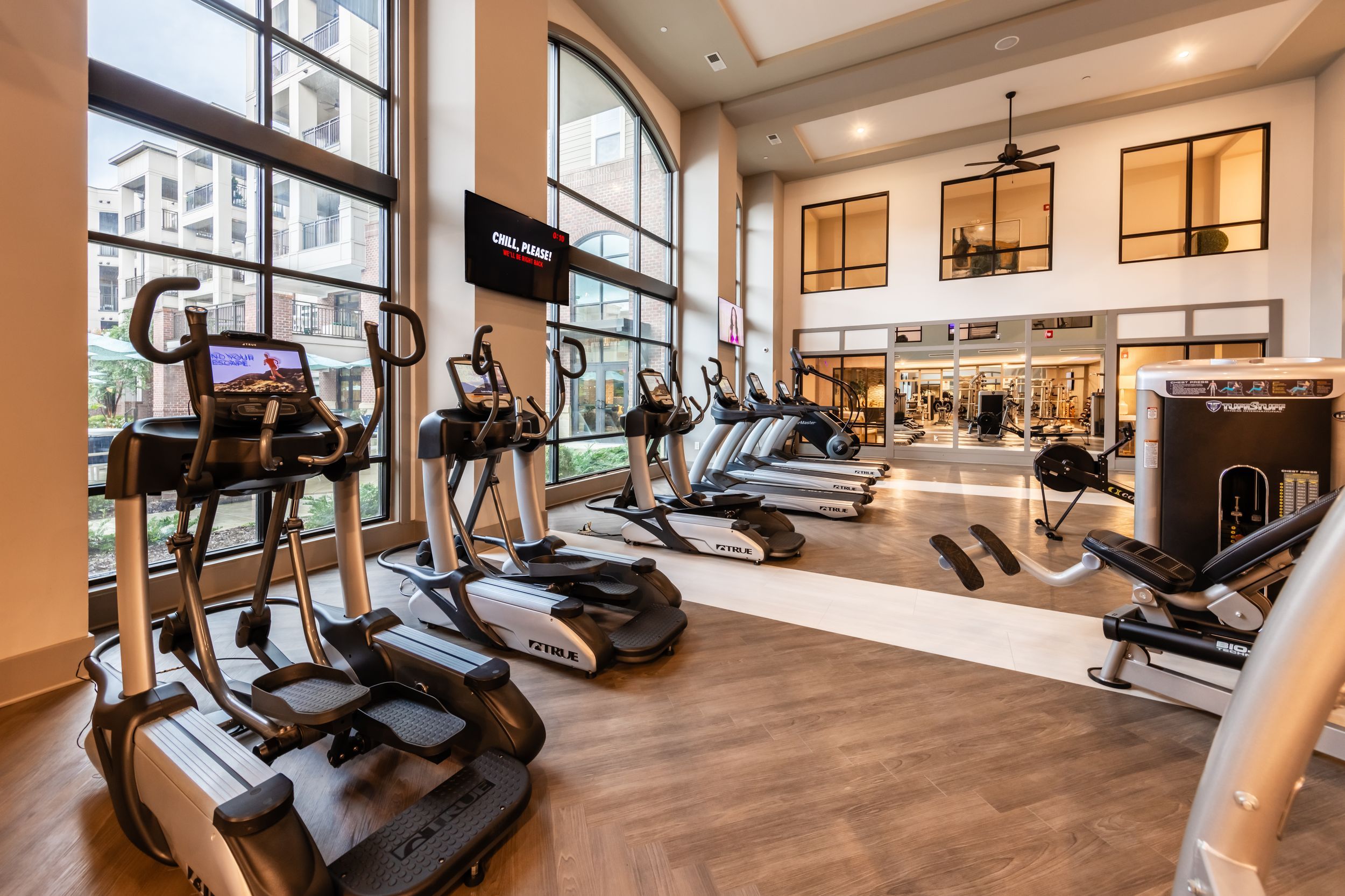 Large health and fitness space with nice gym equipment