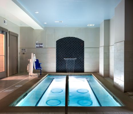 Indoor spa with integrated fountain inside of South Charlotte, NC apartments