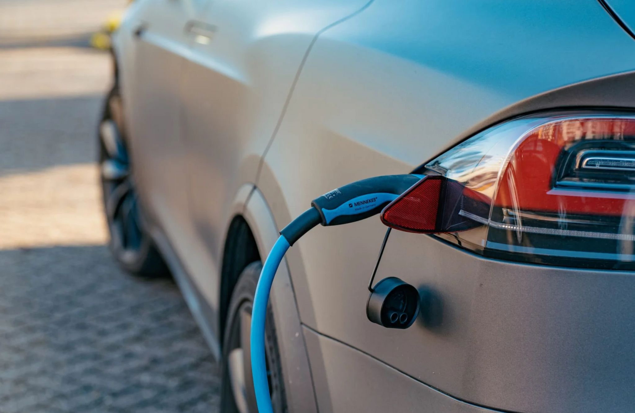 close up of electric car at car charging station