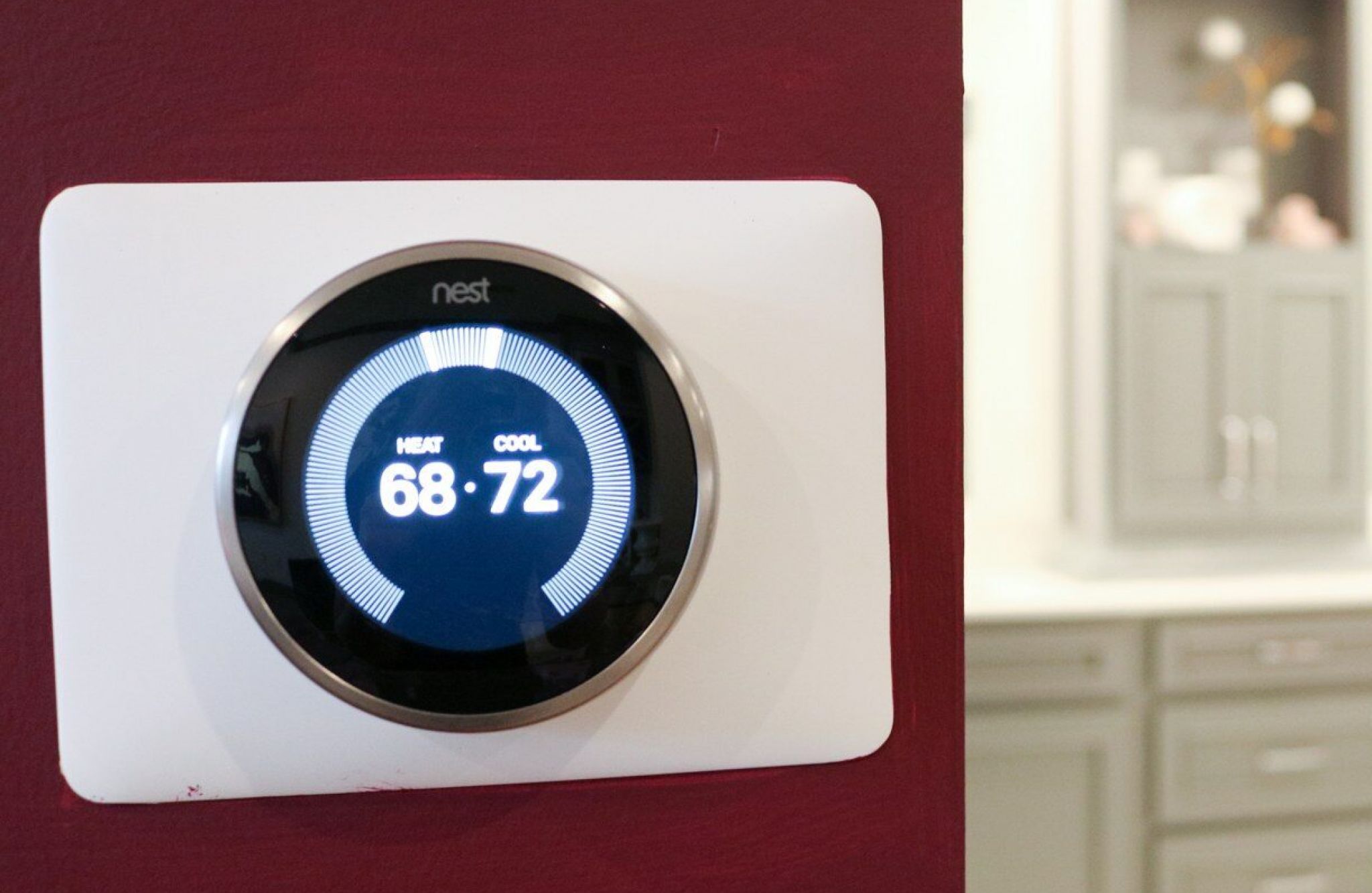 Nest thermostat mounted on apartment wall at Providence Row Apartments