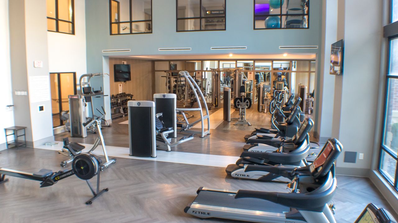 Large health and fitness space with nice gym equipment