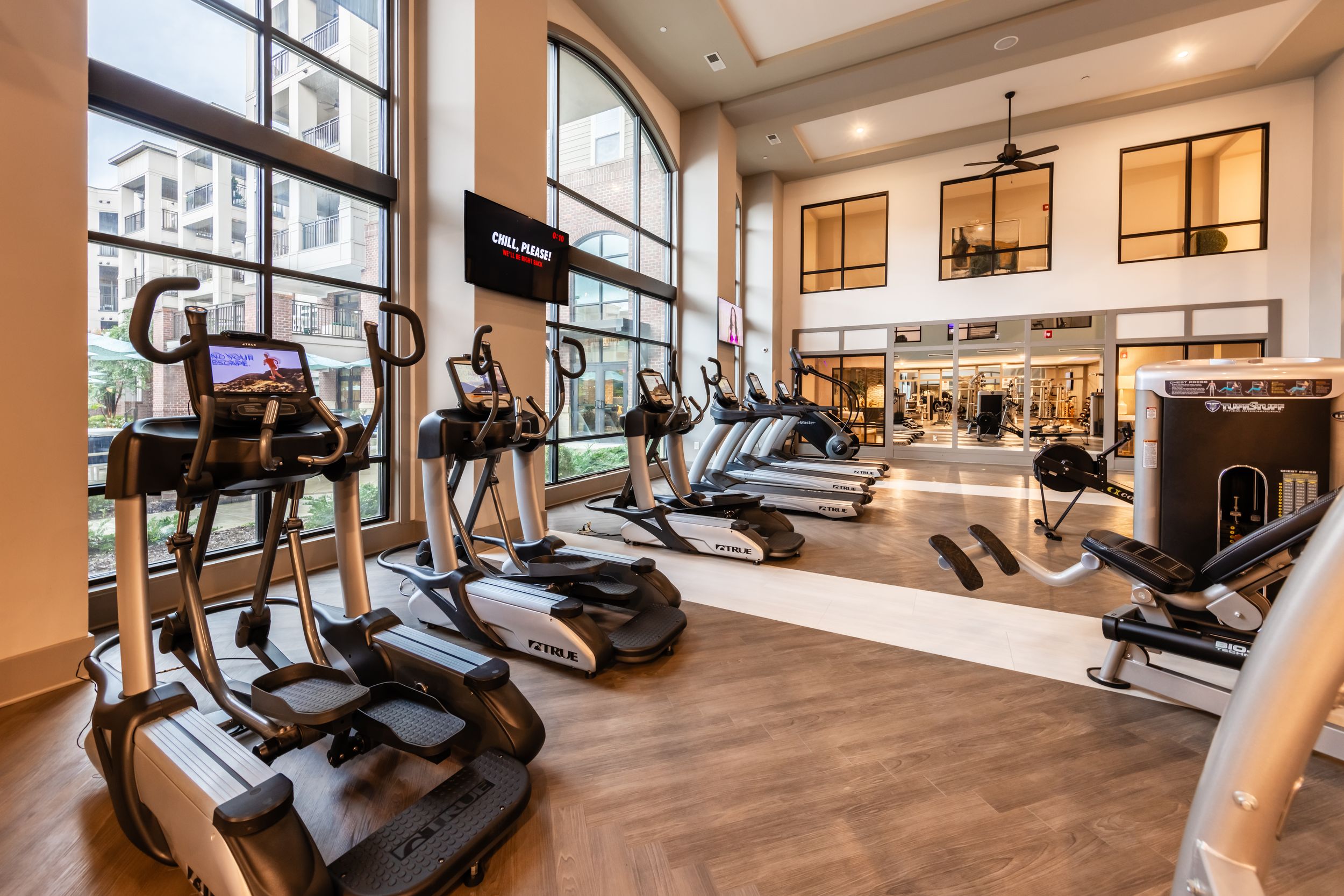 Large health and fitness space with nice gym equipment