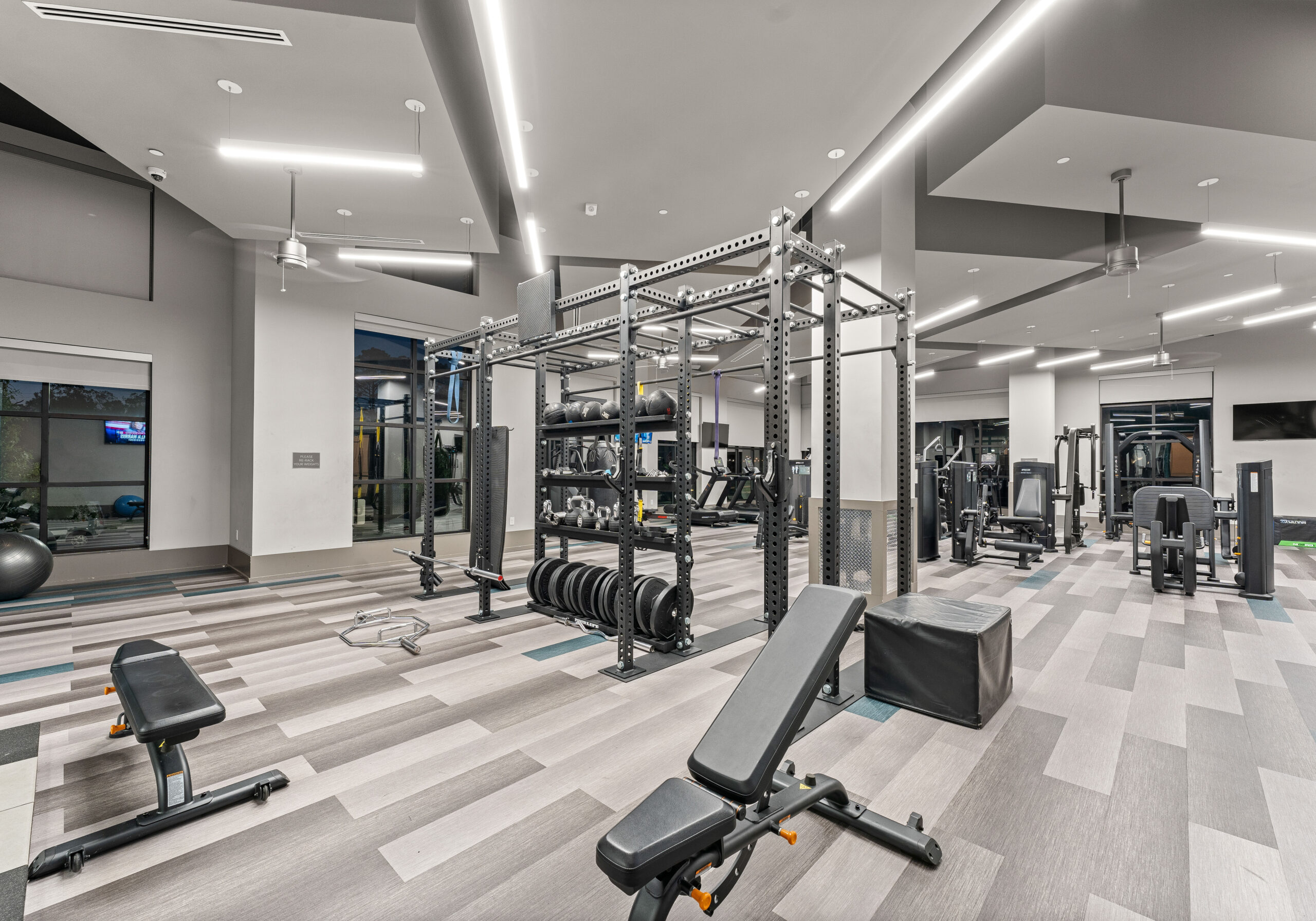 Treadmills, Concept2 rower, and other fitness equipment in Charlotte apartment gym