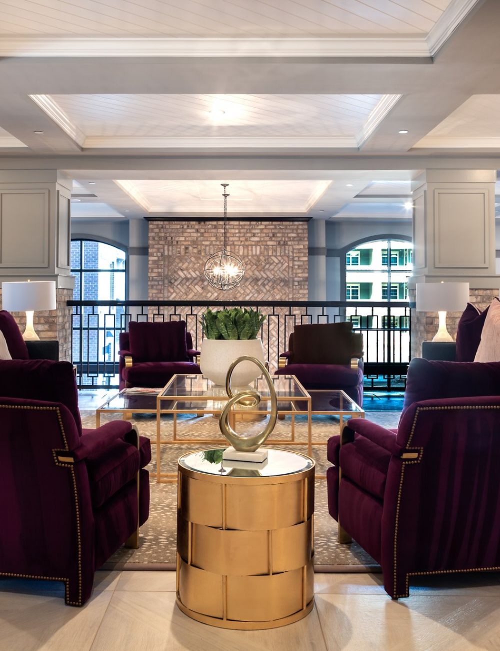 Upstairs lounge with comfortable chairs and a coffee table
